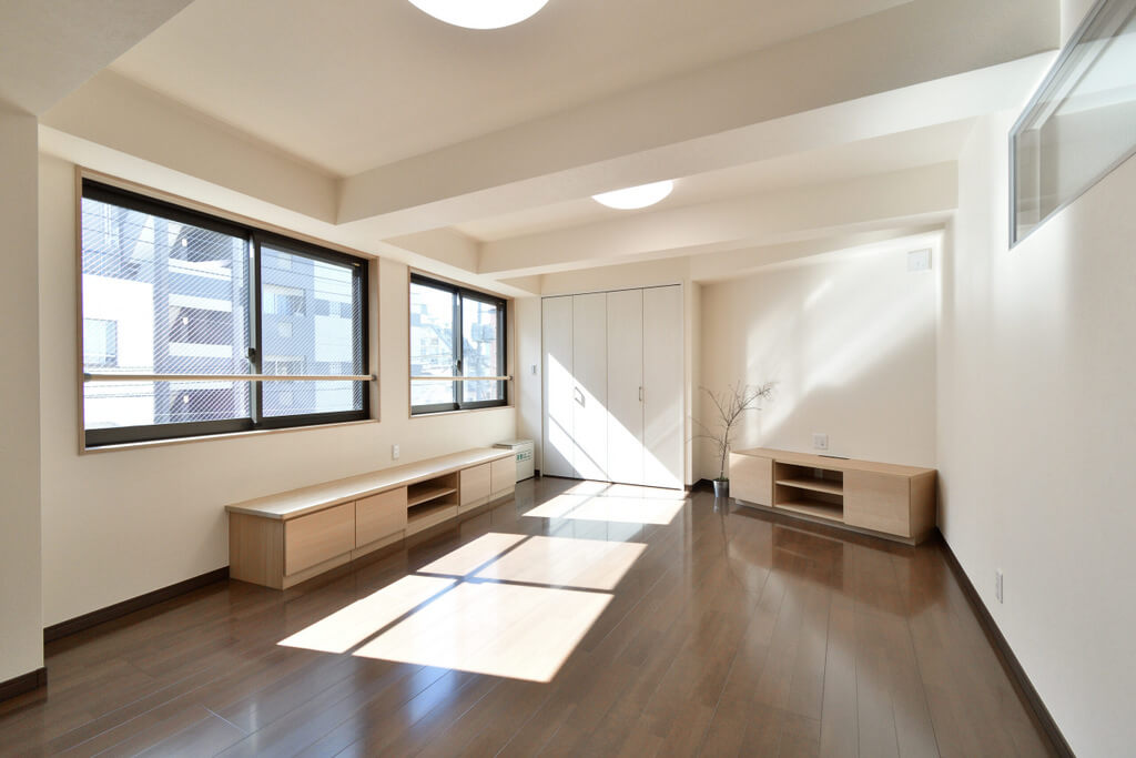 店舗・賃貸住宅・自宅を併設した4階建て鉄筋造の事例